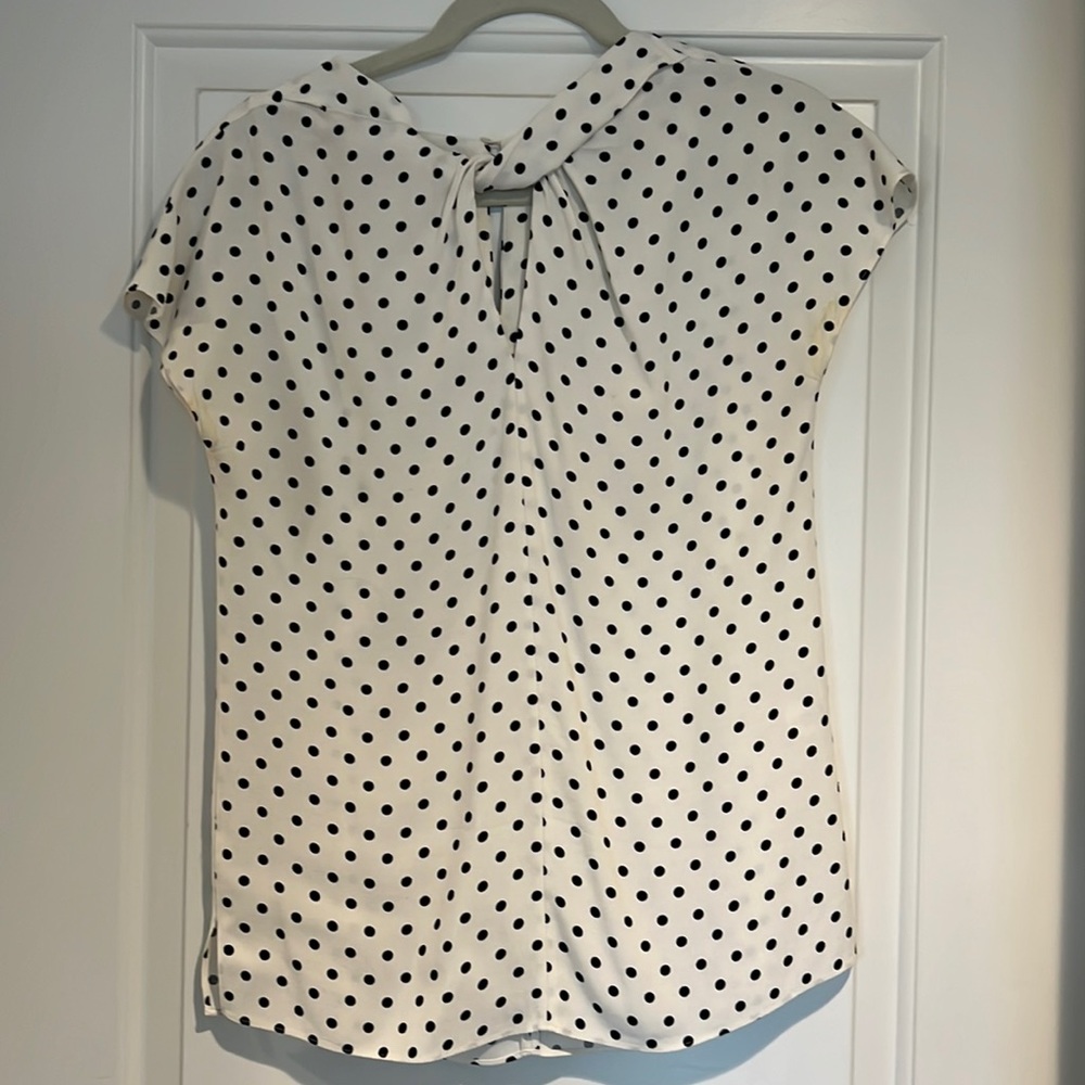 Like new Jigsaw top with twist detail at neckline - size 2